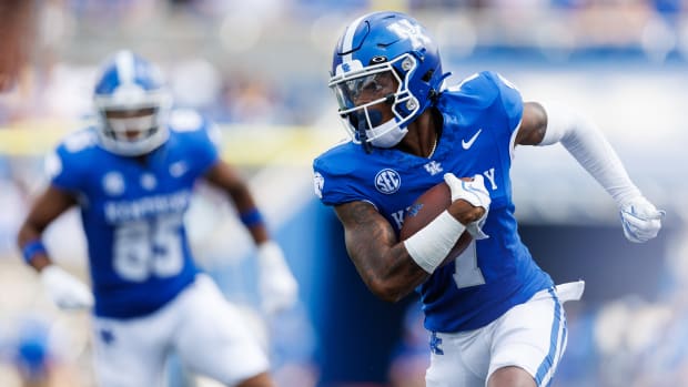 Sep 2, 2023; Lexington, Kentucky, USA; Kentucky Wildcats wide receiver Barion Brown (7) runs the ball during the second quarter against the Ball State Cardinals at Kroger Field. Mandatory Credit: Jordan Prather-USA TODAY Sports